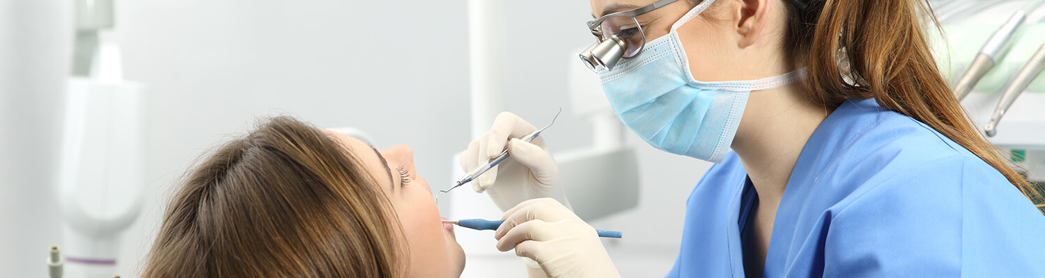 dental patient undergoing an oral cancer screening