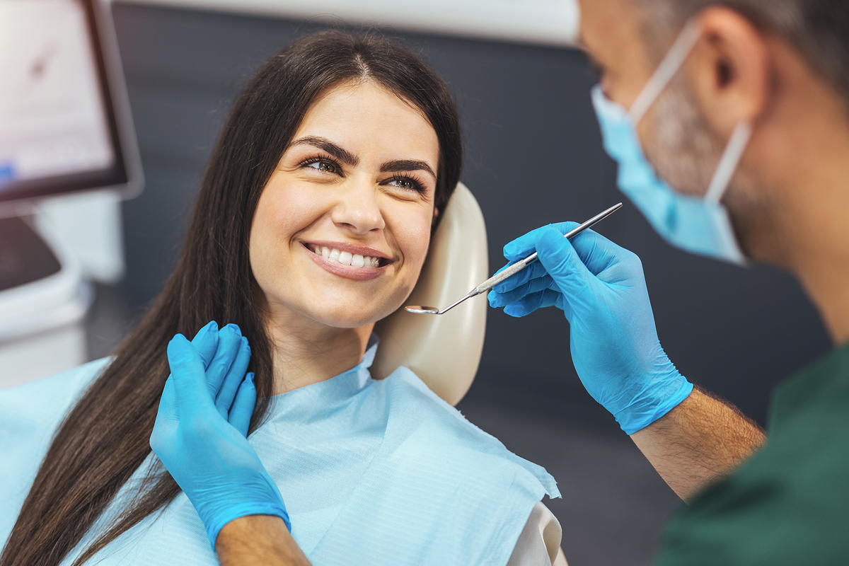 woman smiling at the dentist