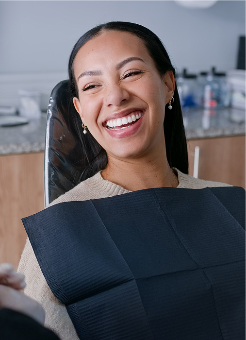 woman smiling in dental chair